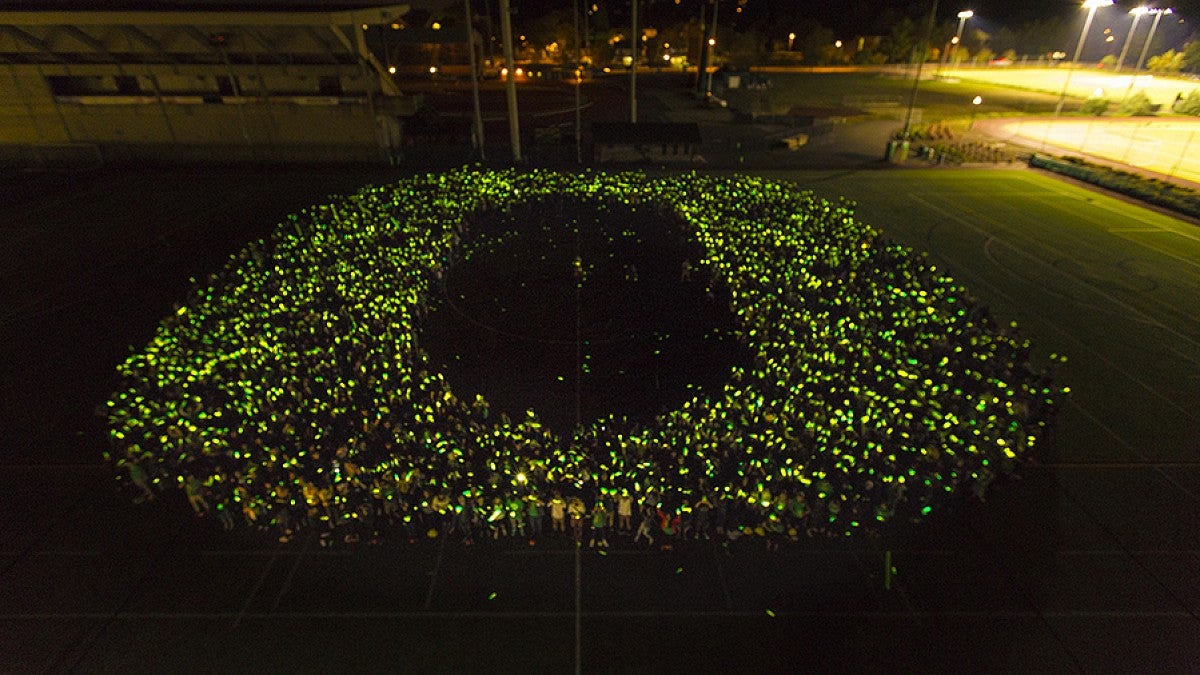 Students forming the O