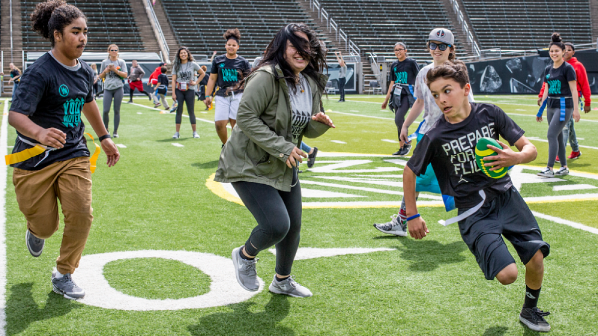 Youngsters playing football