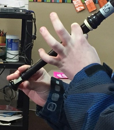 Child playing a recorder