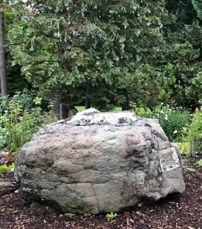 The stone pedestal where The Pioneer statue formerly rested