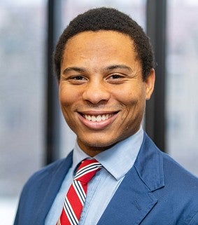 image of Chandler James wearing a red tie