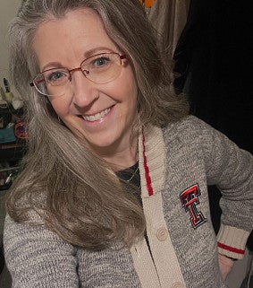Sandee Bybee wearing a Texas Tech sweater