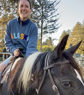 Celia Nittmann on a horse