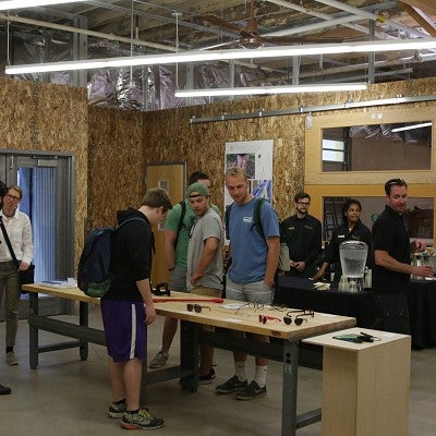 Guests touring the new innovation hub