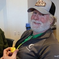 David Flocks holds yellow duck