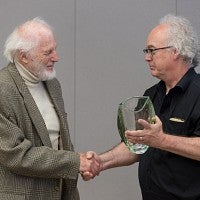 Professor Emeritus and Senate Parliamentarian Paul Simonds (left) and Bill Harbaugh