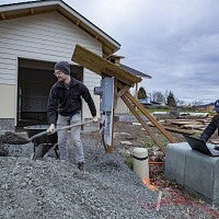 Shoveling gravel