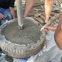 Writing in wet concrete