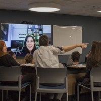 Undergraduate class meeting in DREAM Lab sofa area.