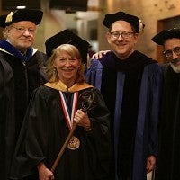 From left: Chuck Lillis, Geri Richmond, Michael Schill, Paul Peppis