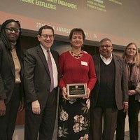 Award winner Barbara Marbury (center) with (from left) DEI Vice President Yvette Alex-Assensoh, President Michael H Schill, Provost Jayanth R. Banavar, and DEI Associate Vice President Vickie DeRose.