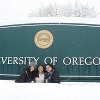 Students next to campus entry